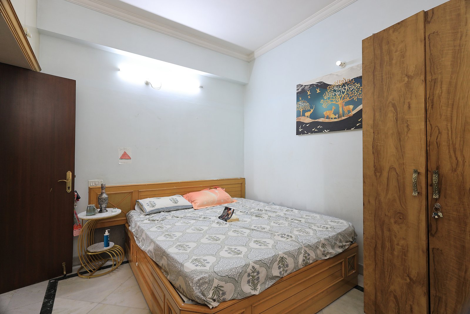 Bedroom 3 with the second wooden wardrobe beside the window