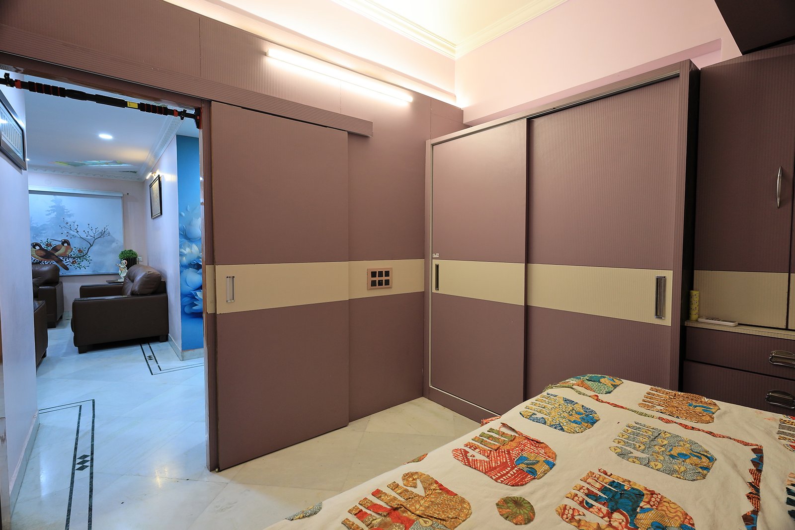 Study / flex room with sliding wardrobe doors and the doorway through to the living room